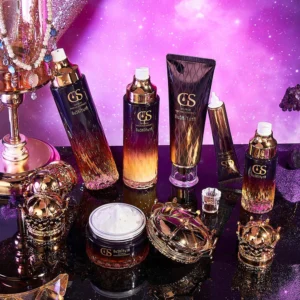 Luxurious cosmetic bottles on purple background